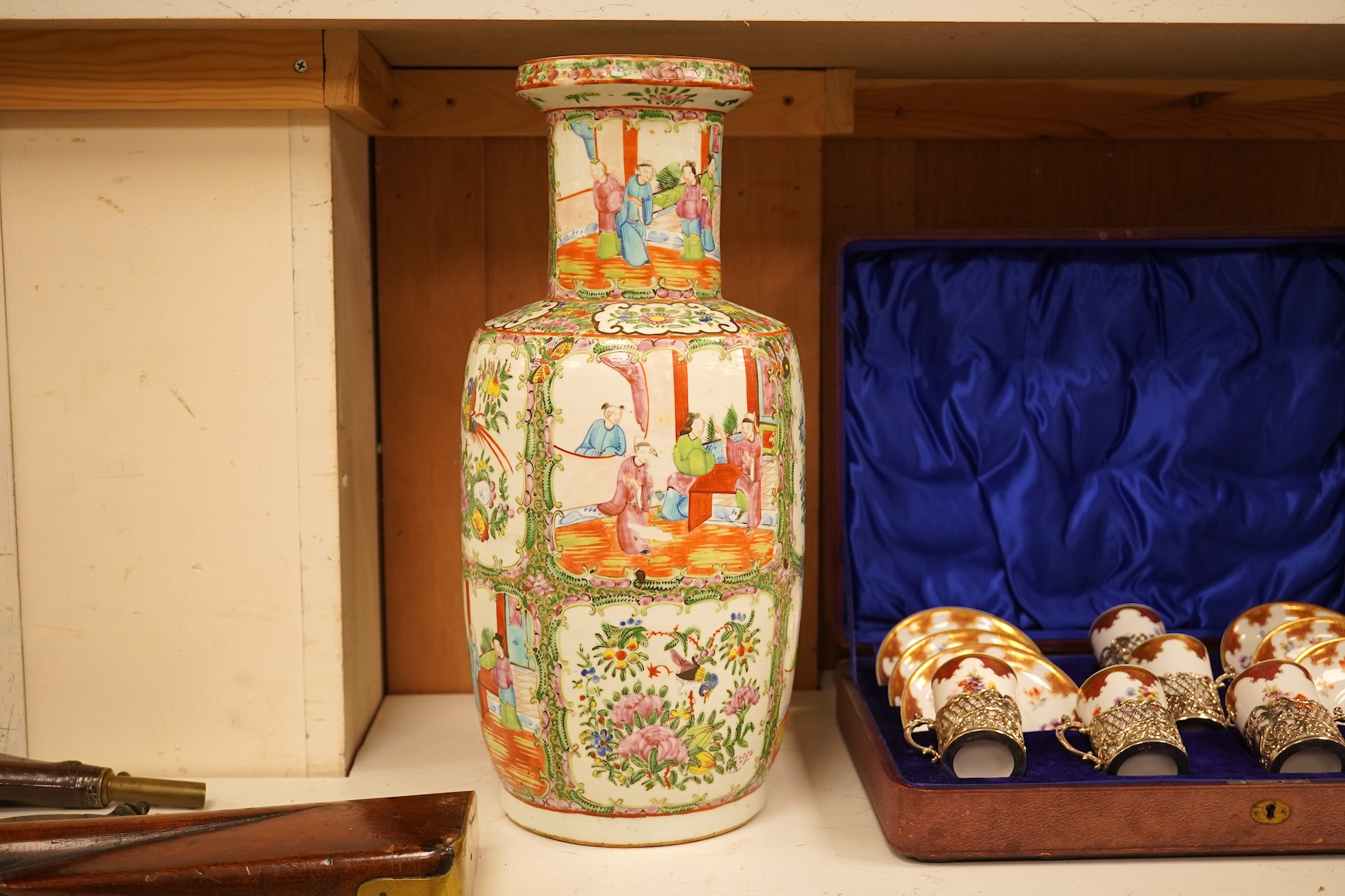 A 19th century Chinese famille rose baluster vase enamelled with flowers and figures, 44cm high